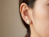 Pearl earrings listing image - On-ear lifestyle crop