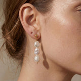 Pearl earrings listing image - On-ear lifestyle crop