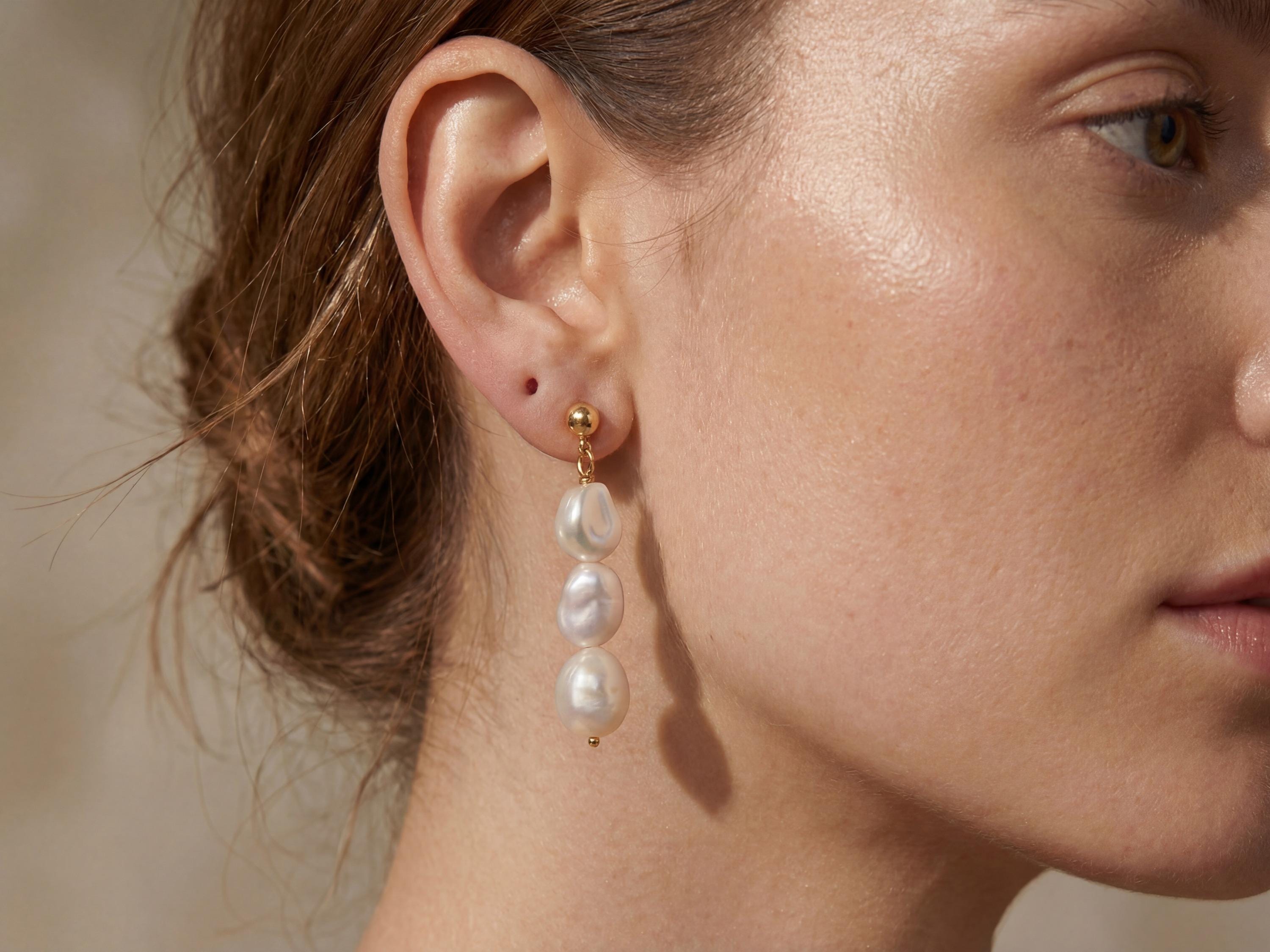 Pearl earrings listing image - On-ear lifestyle crop