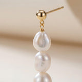 Pearl earrings listing image - Detail macro shot