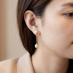 Pearl earrings listing image - On-ear lifestyle crop