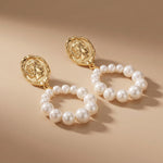 Pearl earrings listing image - Mejuri-like sculptural close-up