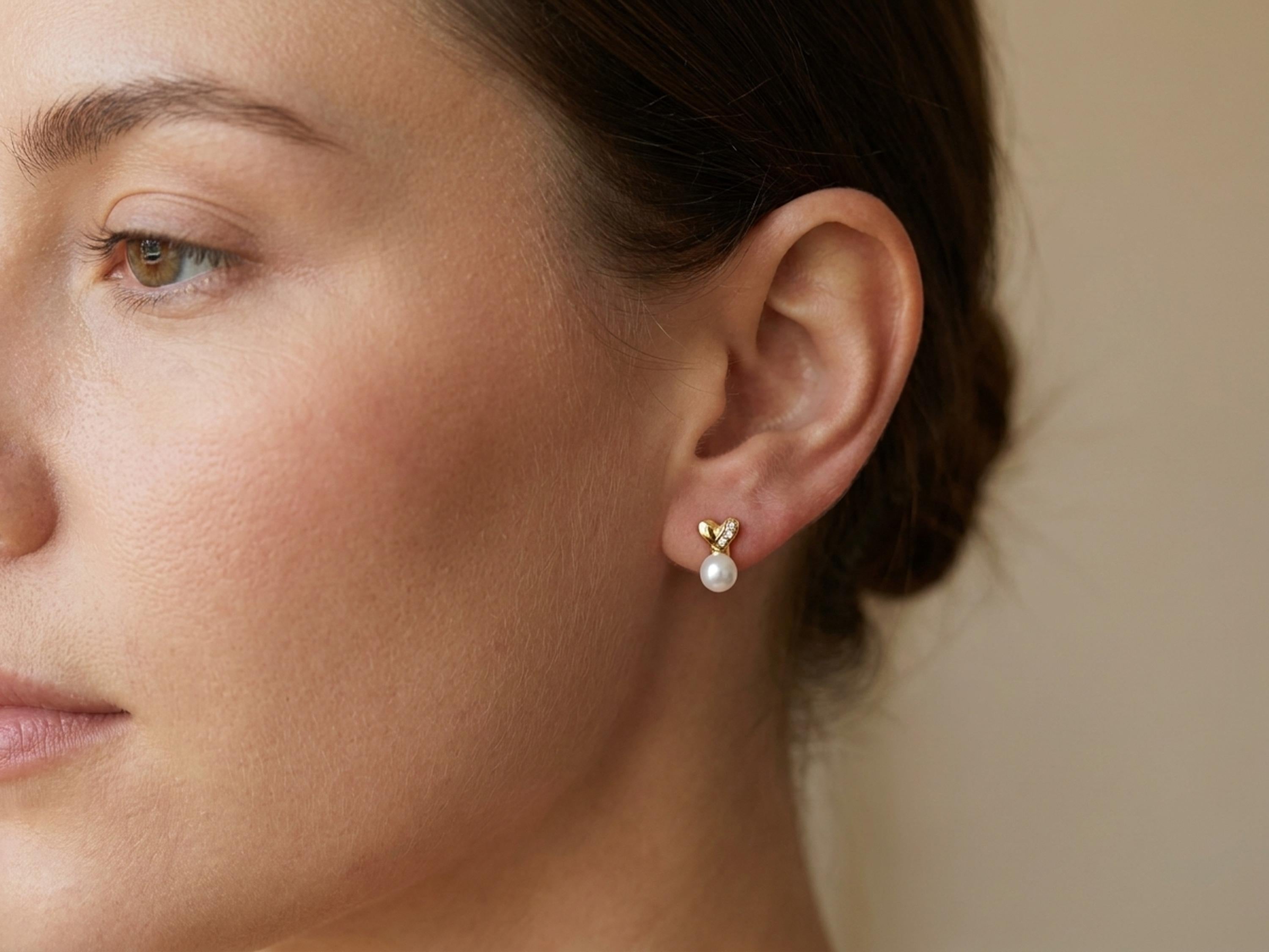 Pearl earrings listing image - On-ear lifestyle crop