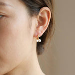 Pearl earrings listing image - On-ear lifestyle crop