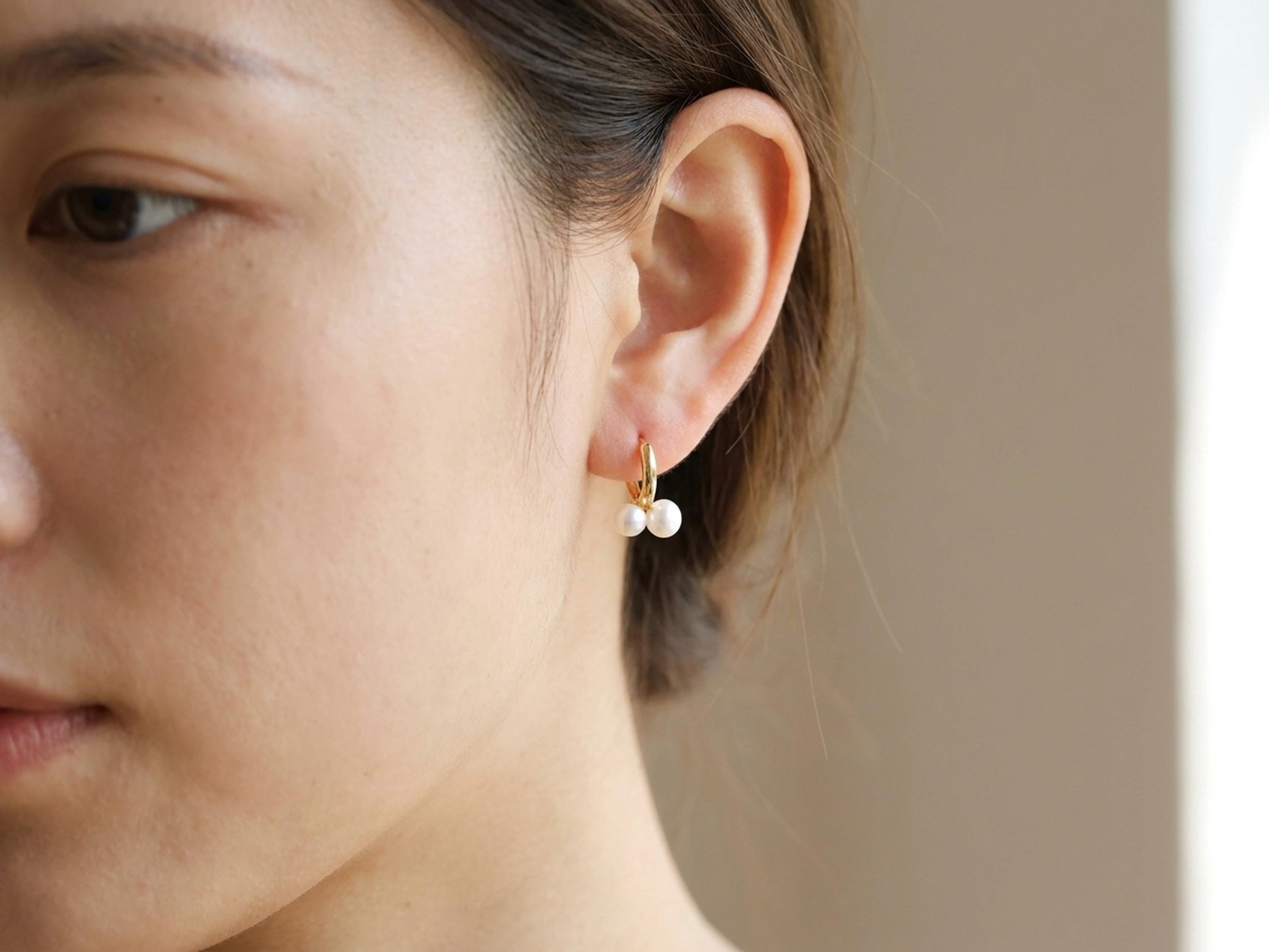Pearl earrings listing image - On-ear lifestyle crop