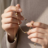 Pearl necklace listing image - Soft editorial hands shot