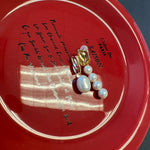 Mismatched pearl earrings with one large pearl and a cluster of four smaller pearls.