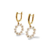 Gold-plated sterling silver hoop earrings with dangling circular freshwater pearl rings.