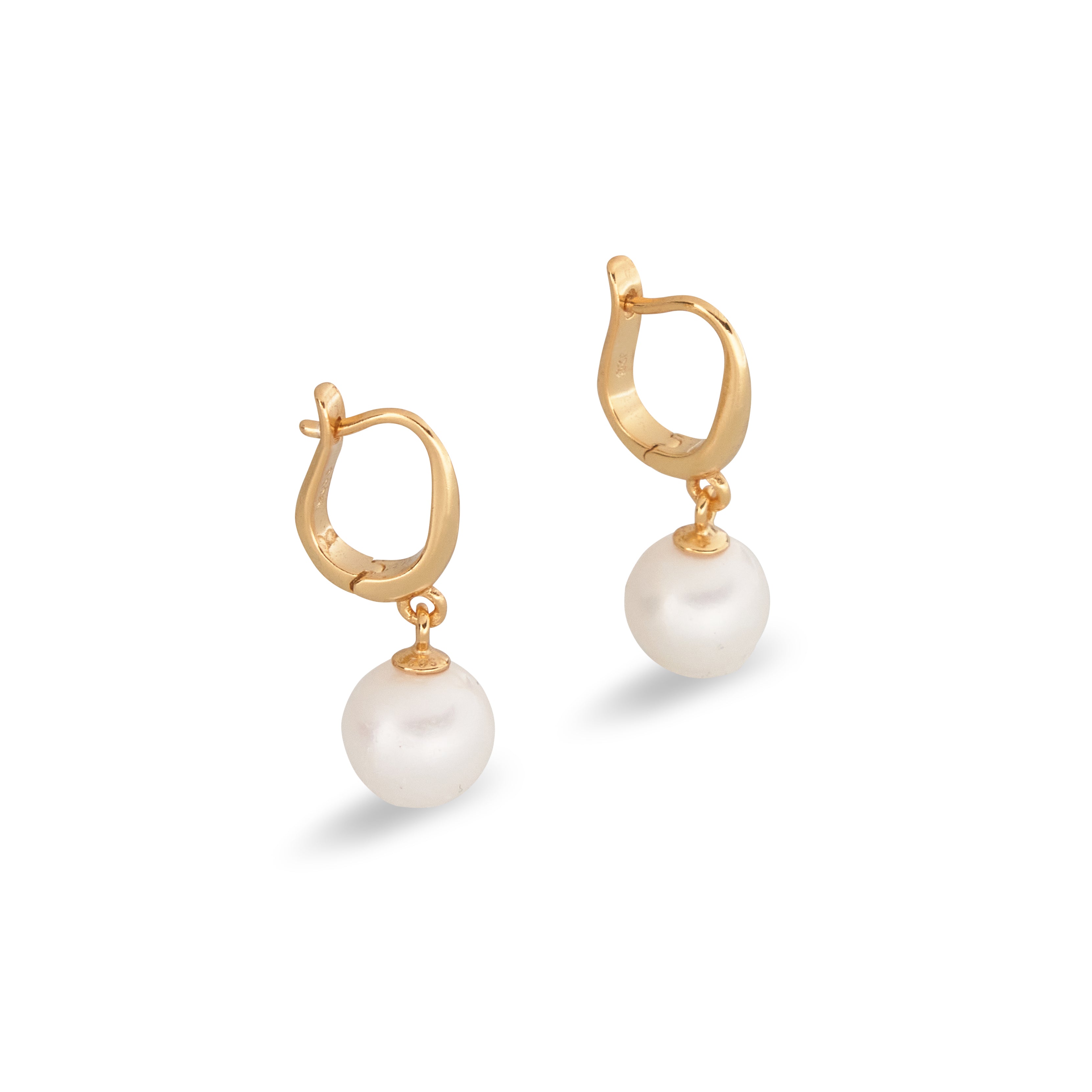 Gold hoop earrings with dangling white pearls.
