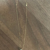A single freshwater Edison pearl necklace with an 18K gold chain.