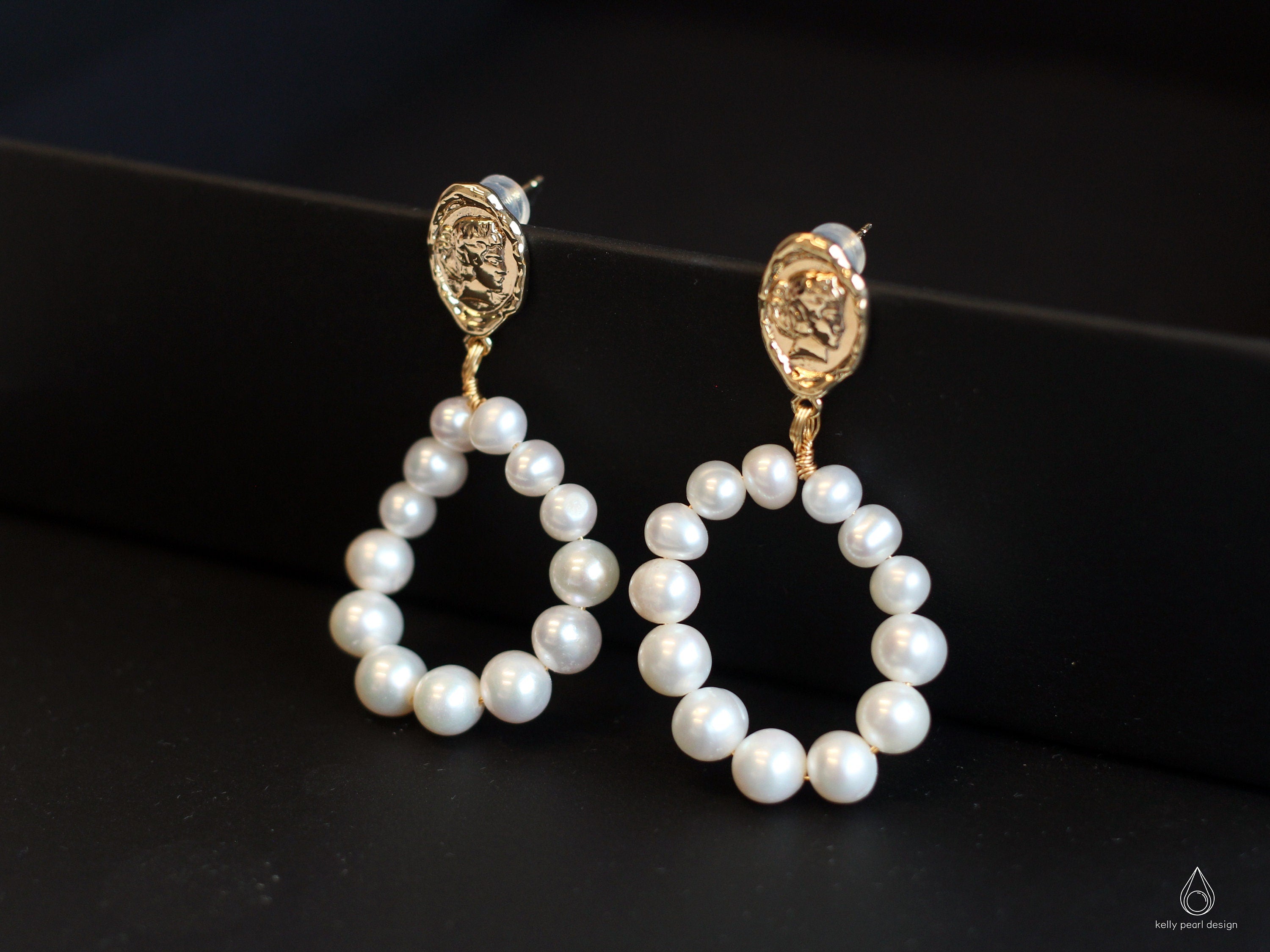 Gold-plated freshwater pearl hoop earrings with a vintage-inspired coin stud.