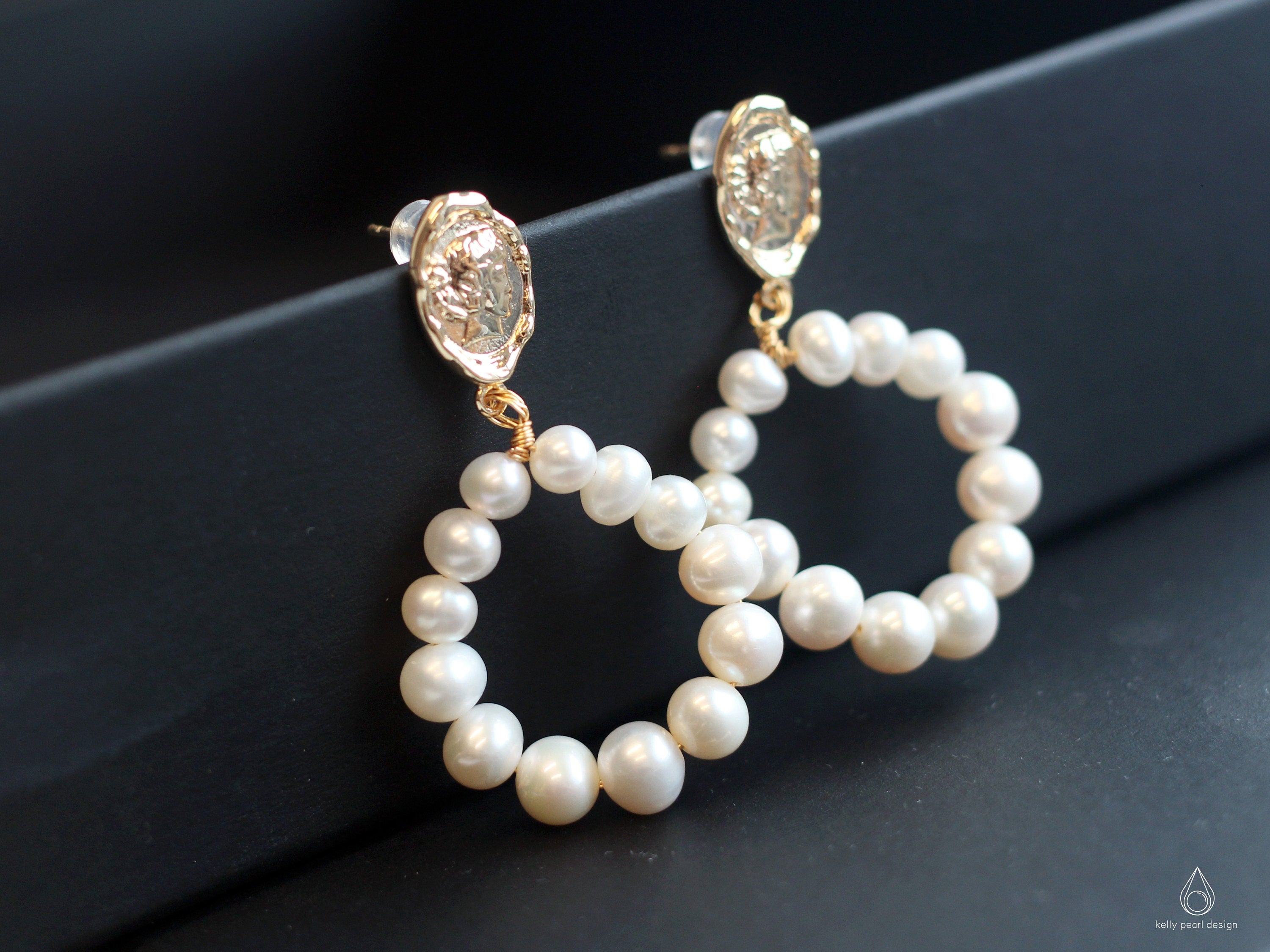 Gold-plated freshwater pearl hoop earrings with a vintage-inspired coin stud.