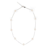 A dainty pearl necklace with a 14K gold-plated chain and eleven pearls.
